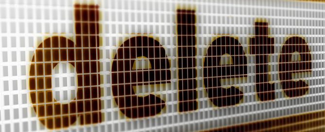 the word delete on a pixelated background