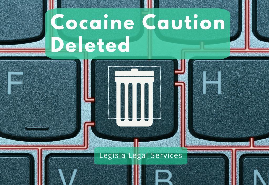 A computer keyboard focused on the delete button with the words cocaine caution deleted legisia legal services.
