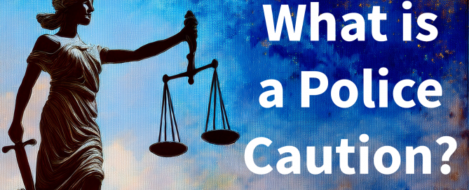 Artistic rendering of lady justice in watercolour with the words, what is a police caution?